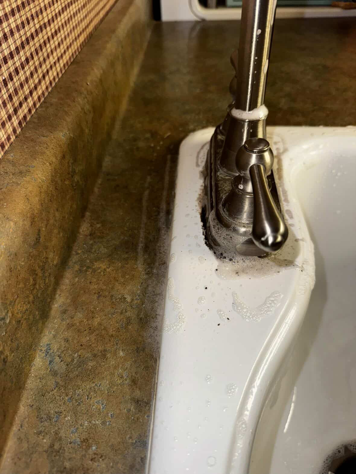 Before sink and faucet cleanup